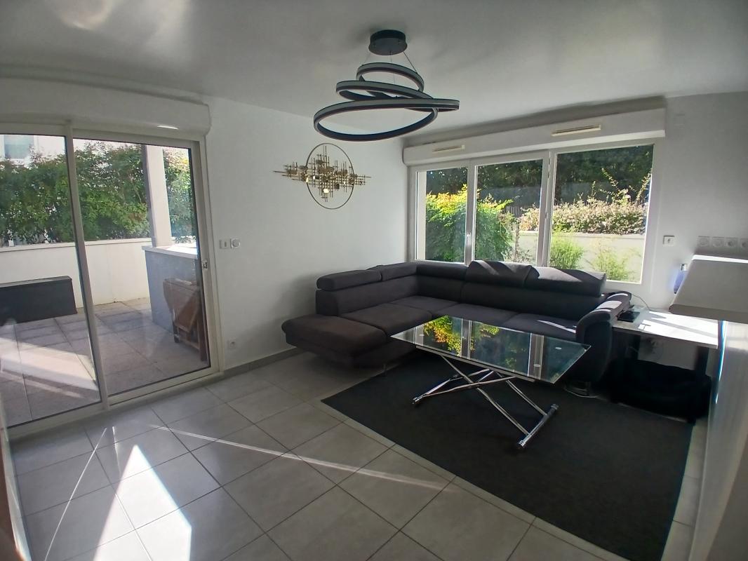 Appartement T3 de 64,68 m² avec terrasse + 2 parkings + Cave - Photo 4 - La Chapelle-sur-Erdre